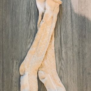 Over the knee cream socks